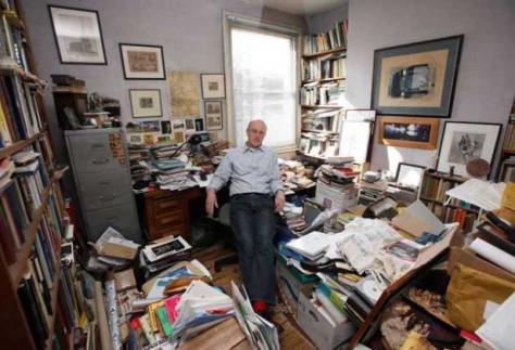 Iain Sinclair surrounded by  the ephemera of  Psychogeography